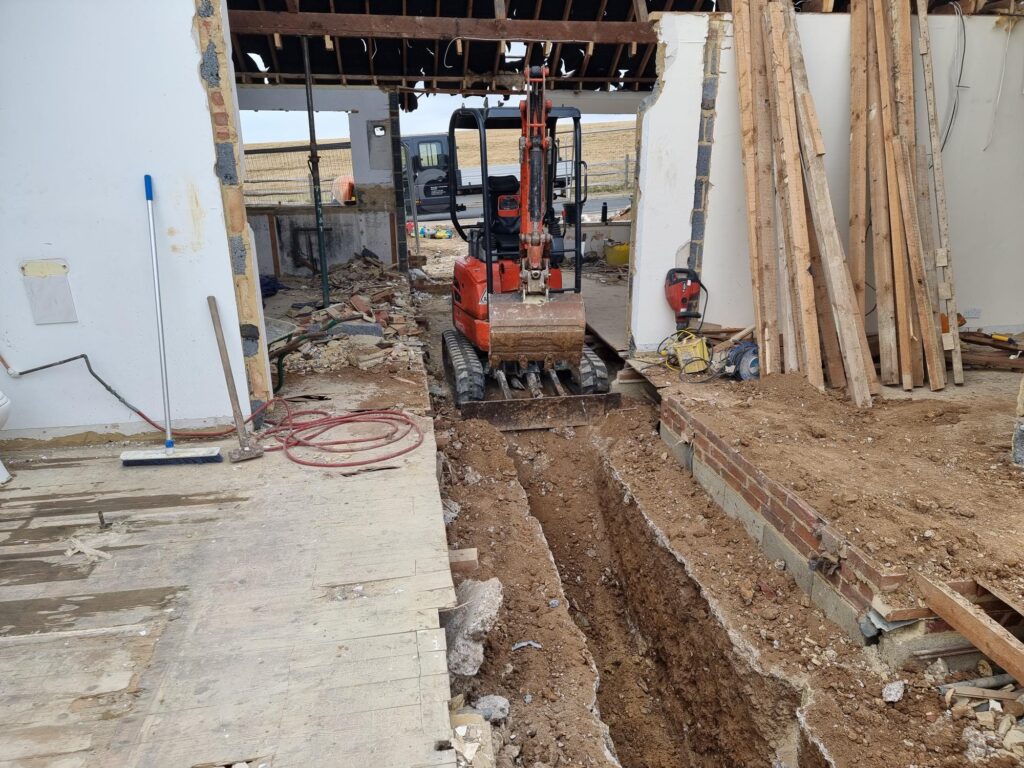 Structural engineering foundation design for residential construction based on ground conditions and load requirements